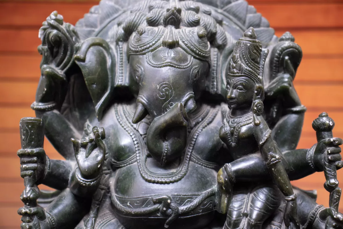 Stone sculpture of Ganesha in sitting position