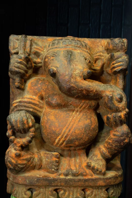 Stone Ganesha sculpture in sitting position