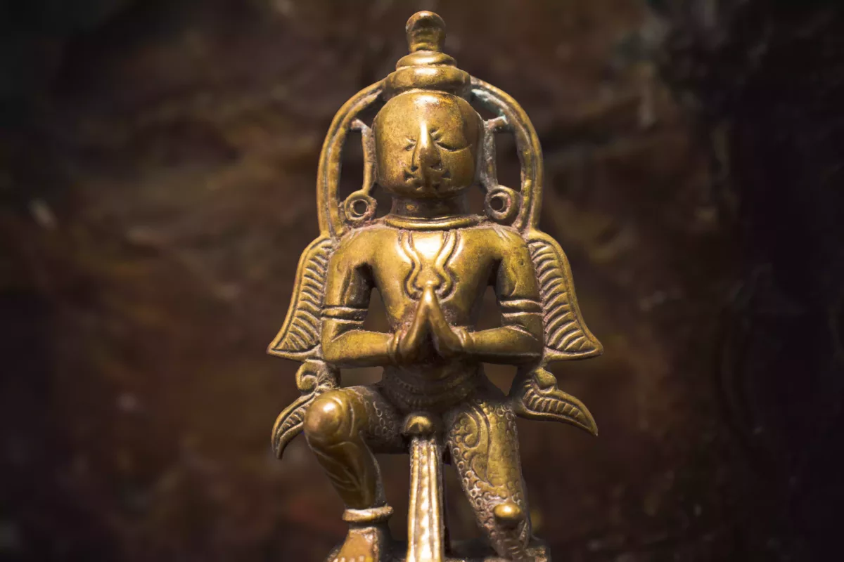 Garuda Bronze sculpture folded hands sitting on one knee