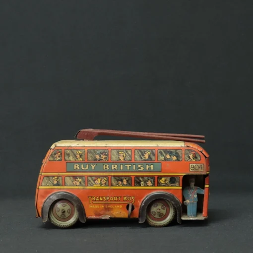 british transport tin toy bus side view 3