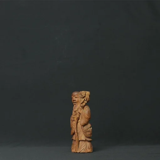 chinese wise man wooden sculpture side view 1
