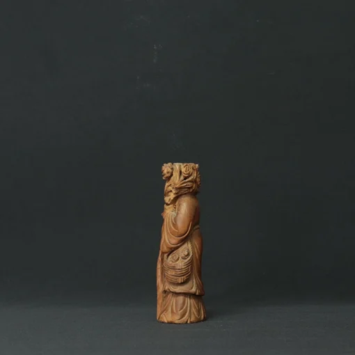 chinese wise man wooden sculpture side view 2