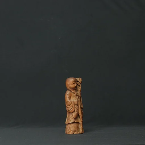 chinese wise man wooden sculpture side view 3