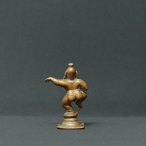 dancing baby krishna bronze sculpture back view