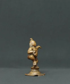 dancing baby krishna bronze sculpture side view 1