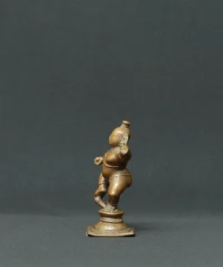 dancing baby krishna bronze sculpture side view 3