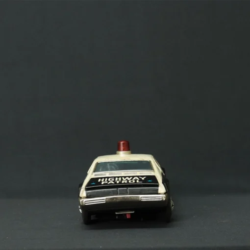 highway patrol tin toy car back view
