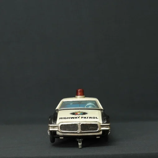 highway patrol tin toy car front view