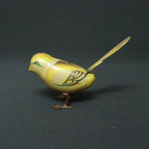 sparrow tin toy bird side view 1