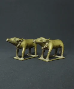 bhuta buffalo pair bronze sculpture side view 1