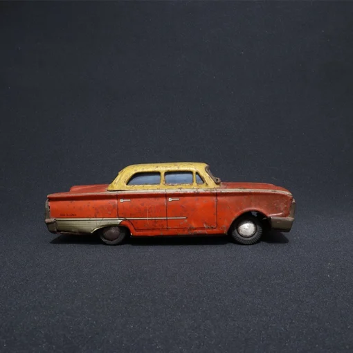 car tin toy collectible side view 2