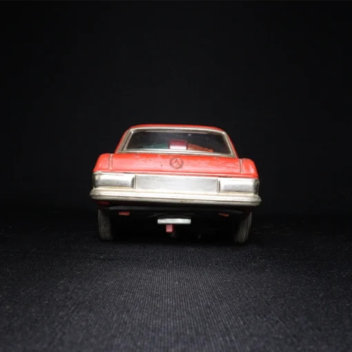 table tin toy car back view