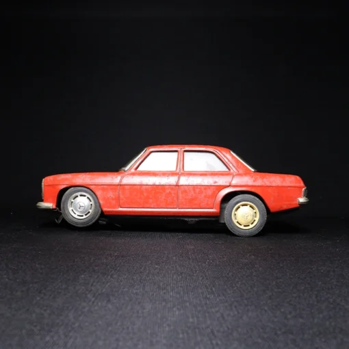 table tin toy car side view 2