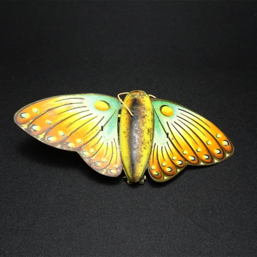 tin toy butterfly back view