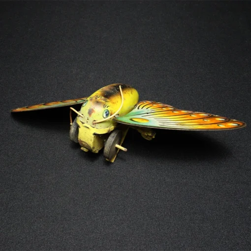 tin toy butterfly side view 1