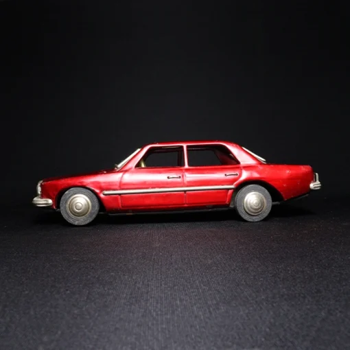 tin toy car III side view 2