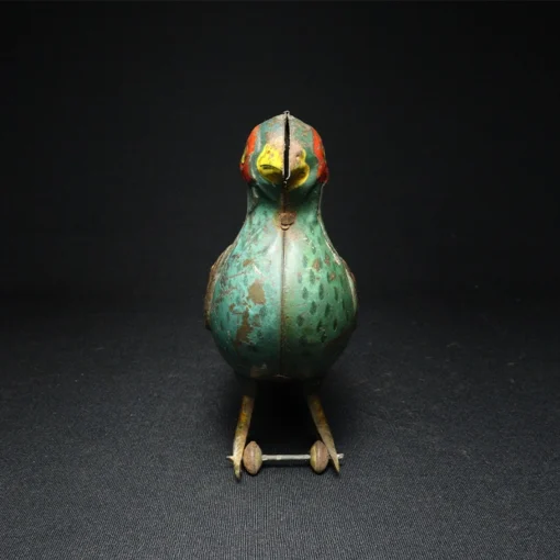 peacock tin toy front view