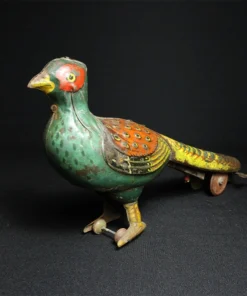 peacock tin toy side view 1