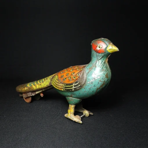 peacock tin toy side view 3