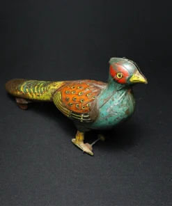 peacock tin toy top view