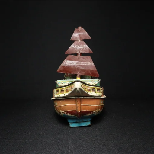 ship tin toy front view