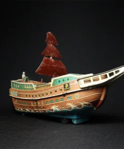 ship tin toy side view 2