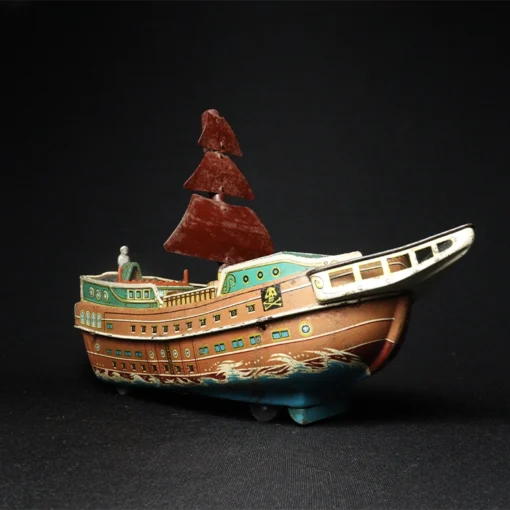 ship tin toy side view 2