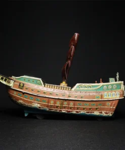 ship tin toy side view 3