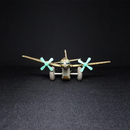 tin toy airplane front view