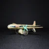 tin toy airplane side view 1