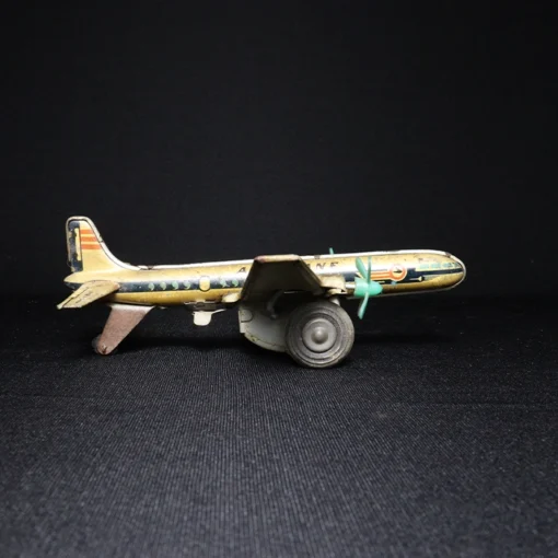 tin toy airplane side view 4