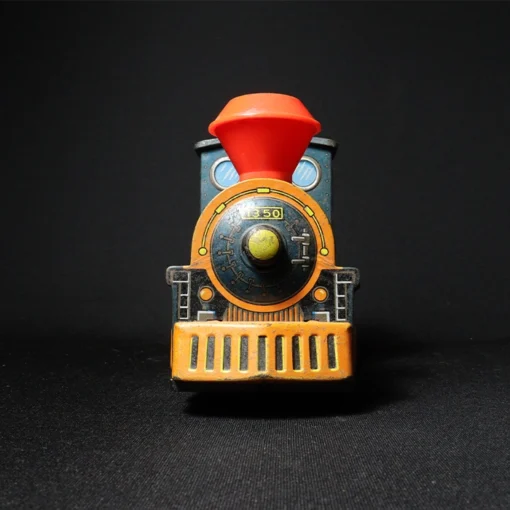 tin toy train engine front view