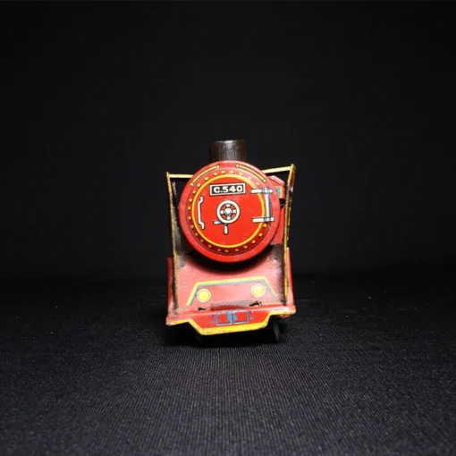 train engine tin toy front view