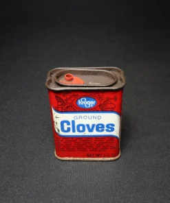 ground cloves tin can top view