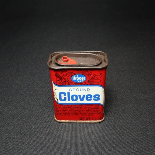 ground cloves tin can top view