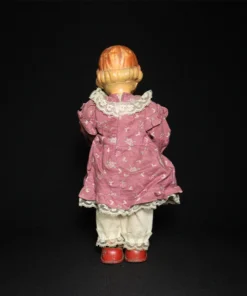 doll tin toy back view