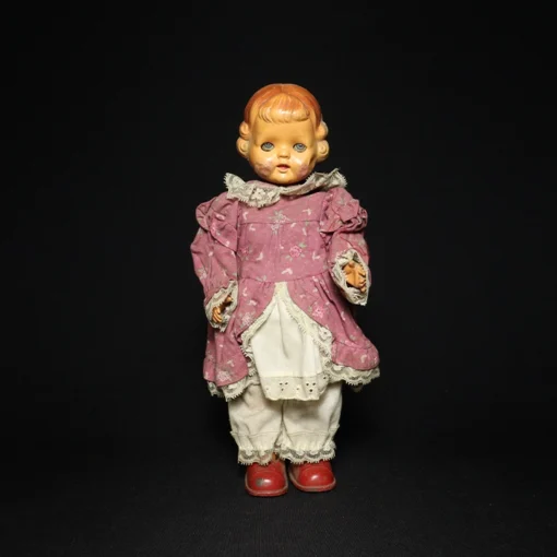 doll tin toy front view