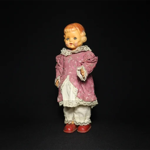 doll tin toy side view 1