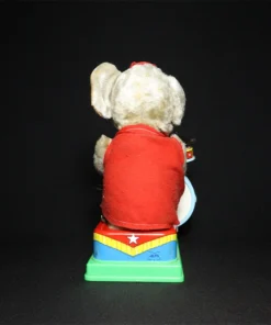 tin toy drummer elephant back view