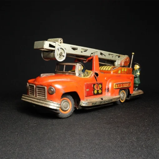 fire brigade truck tin toy side view 1