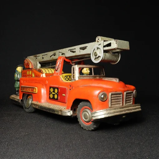 fire brigade truck tin toy side view 2