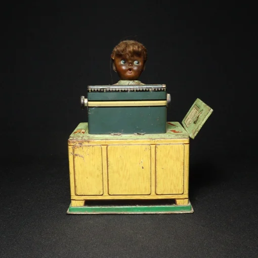 tin toy lady typewriter front view