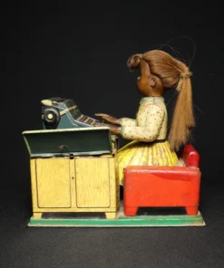 tin toy lady typewriter side view 2
