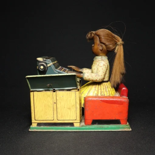tin toy lady typewriter side view 2