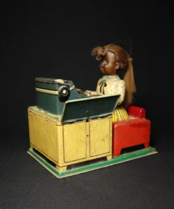tin toy lady typewriter side view