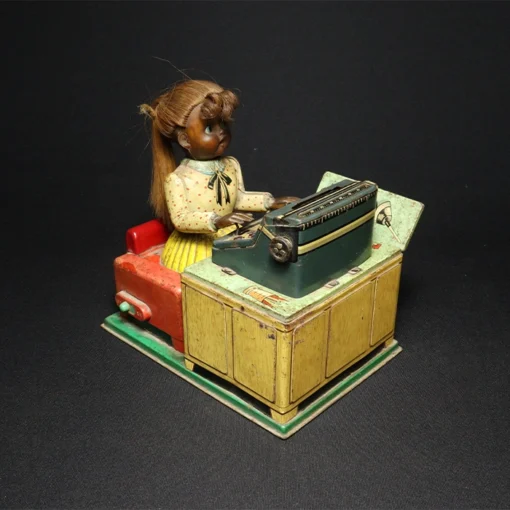 tin toy lady typewriter side view 3