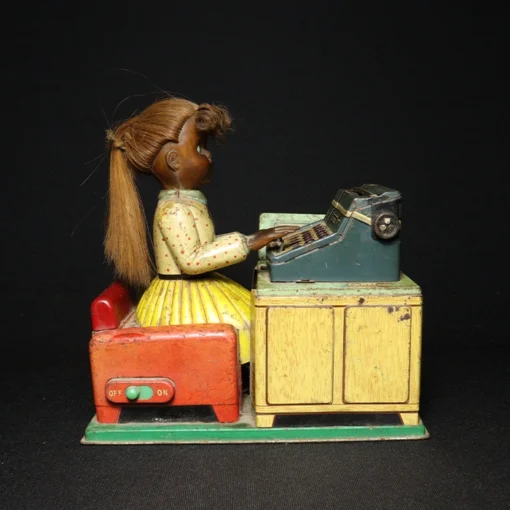 tin toy lady typewriter side view 4