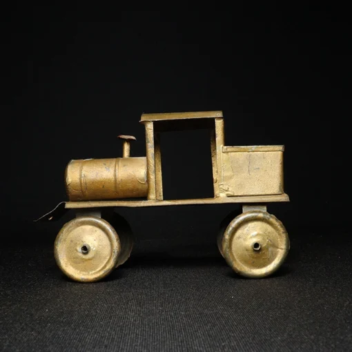 tin toy model train engine side view 3