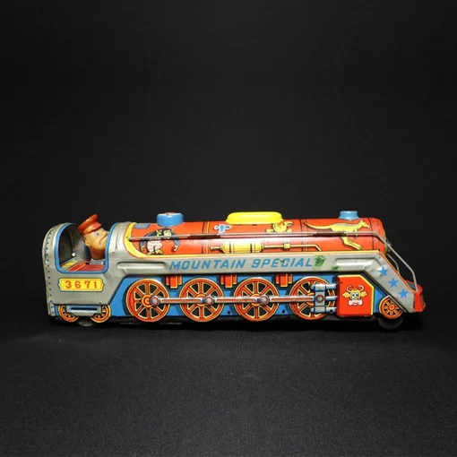 tin toy train engine side view 4