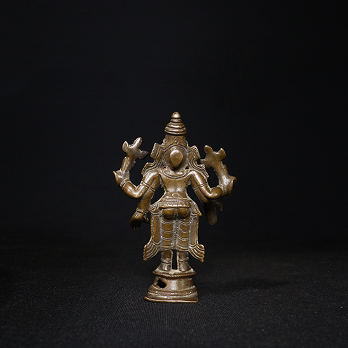 antique god vishnu bronze sculpture back view